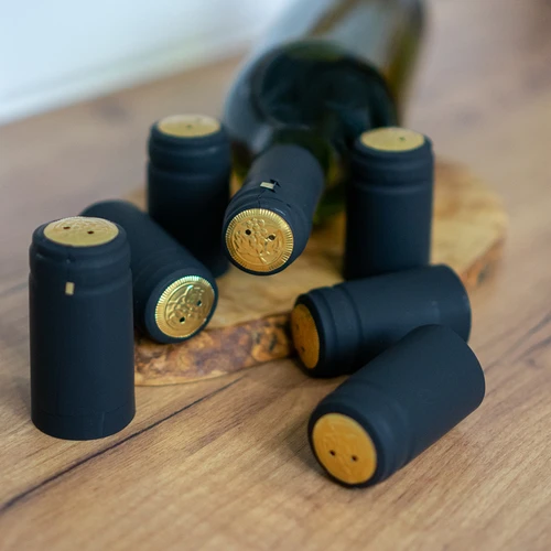 Svarta hättor med perforering fi31mm 100st. - 2